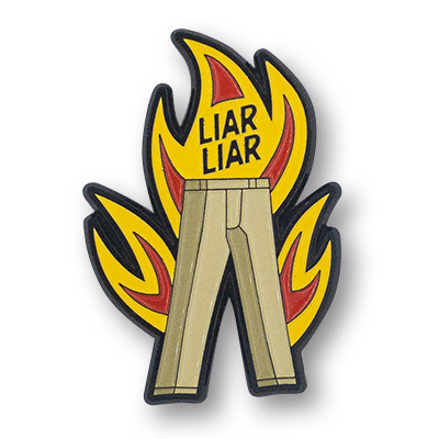 The Liar Liar enamel pin - khaki trousers surrounded by flames
